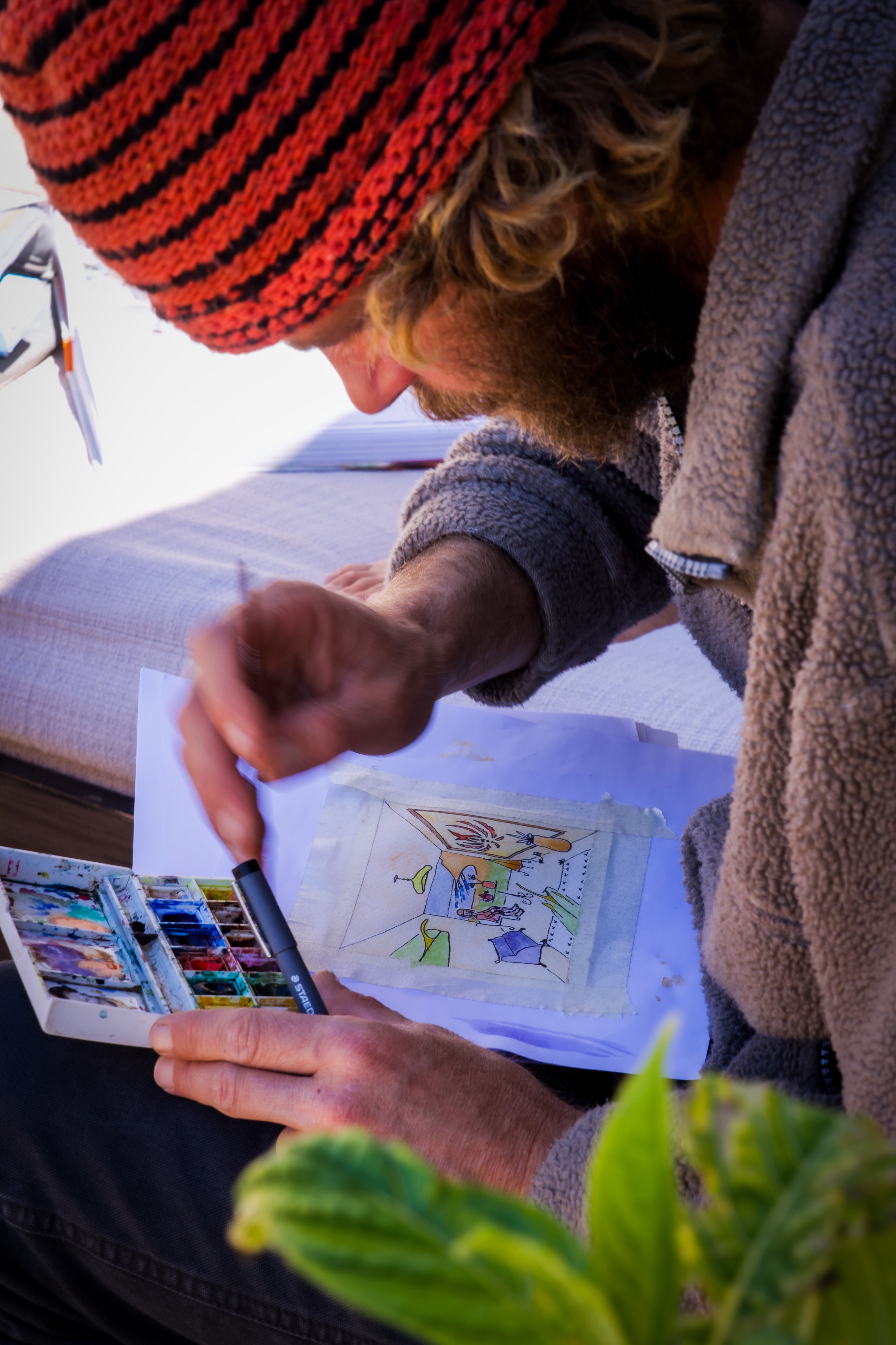 Omer painting a watercolour study at Dar Gamila